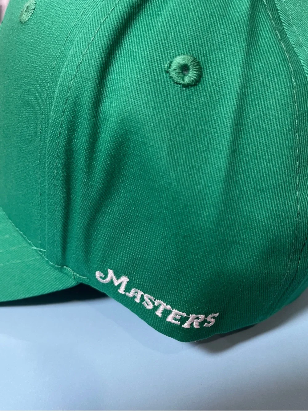 Masters Green Hat with Yellow & Red Logo